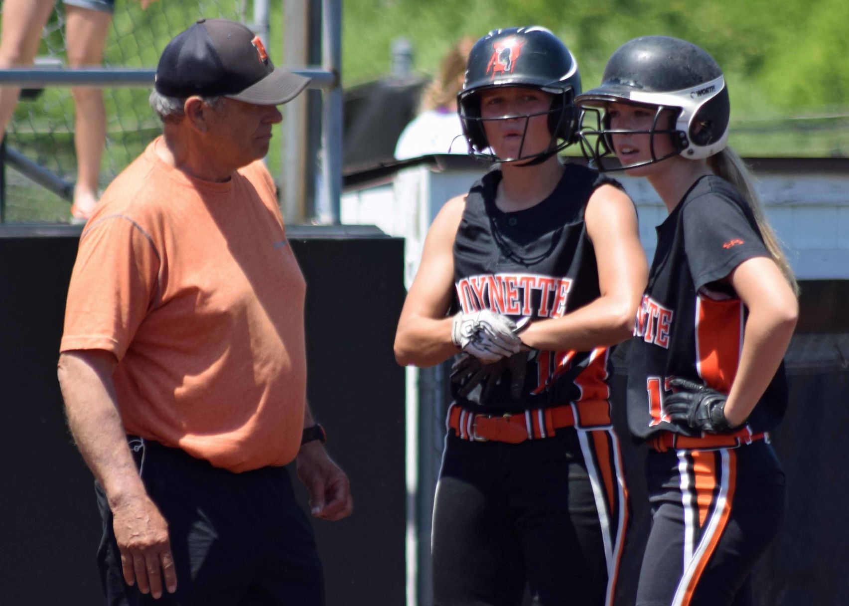 Poynette coach Bob Tomlinson, Brianna Kowald and Casey Fountain